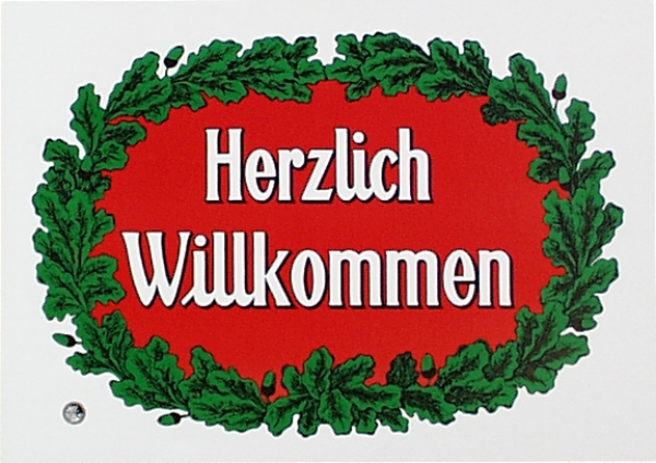 "Herzlich Willkommen" Plakat, 34x48cm groß, mit weißer Schrift auf rotem Feld und grünem Kranz